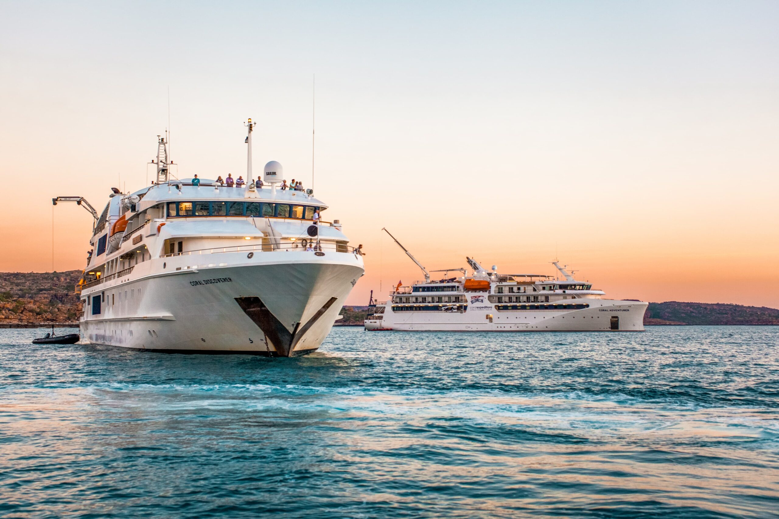 Coral Adventurer and Coral Discoverer in Kimberley Waters Two expedition cruise vessels, the Coral Adventurer and Coral Discoverer, are anchored together