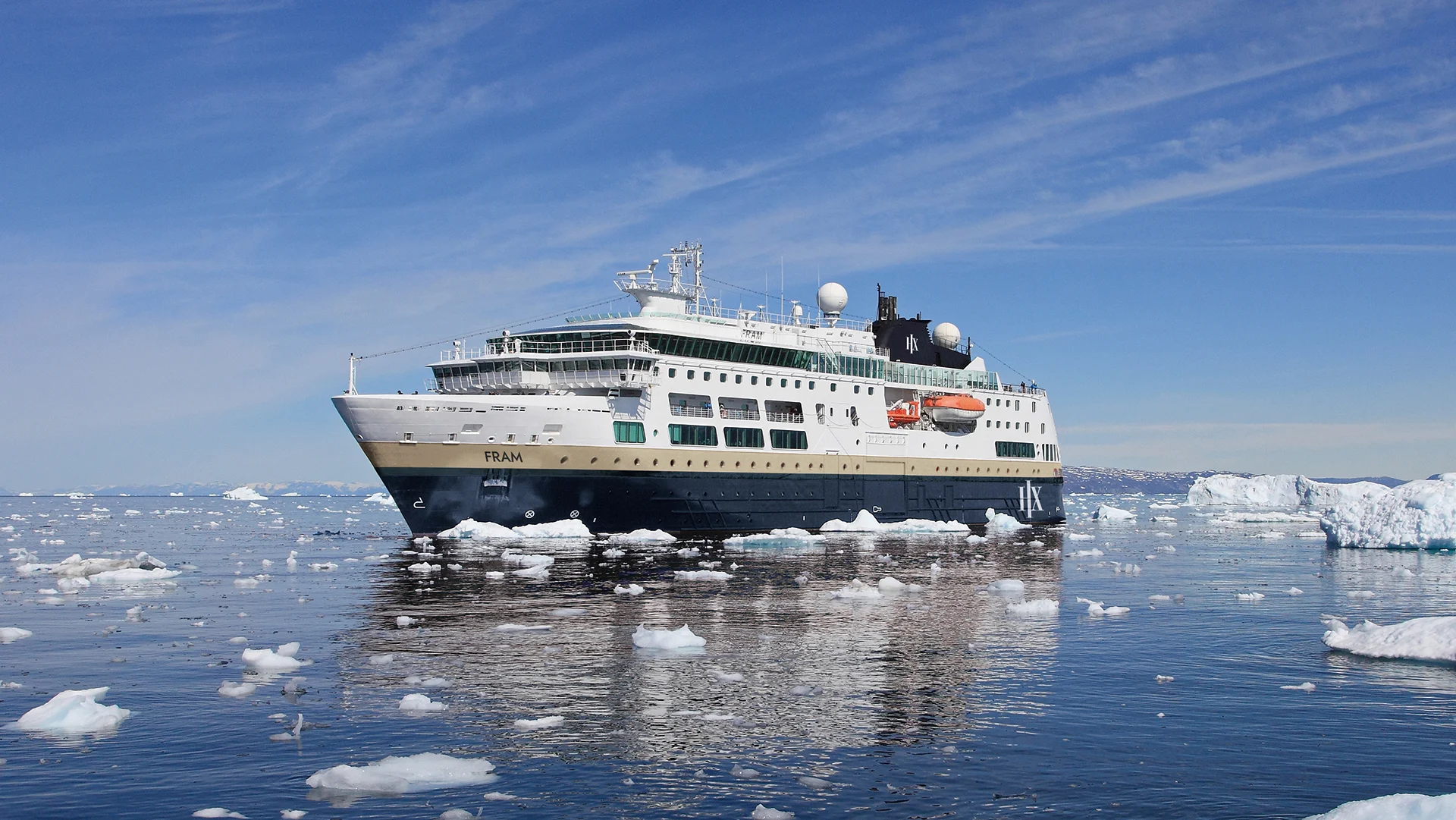 MS Fram Expedition Ship in Arctic Ice The MS Fram, a luxury expedition cruise ship, navigates through icy Arctic waters surrounded