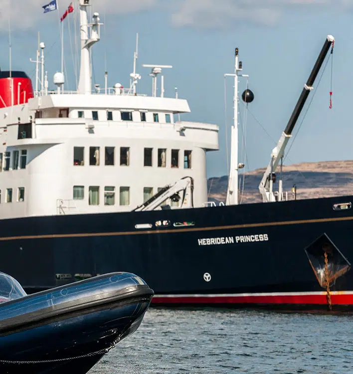 Hebridean Princess Cruise Ship at Port The Hebridean Princess, a small luxury expedition cruise ship, is docked at port with its