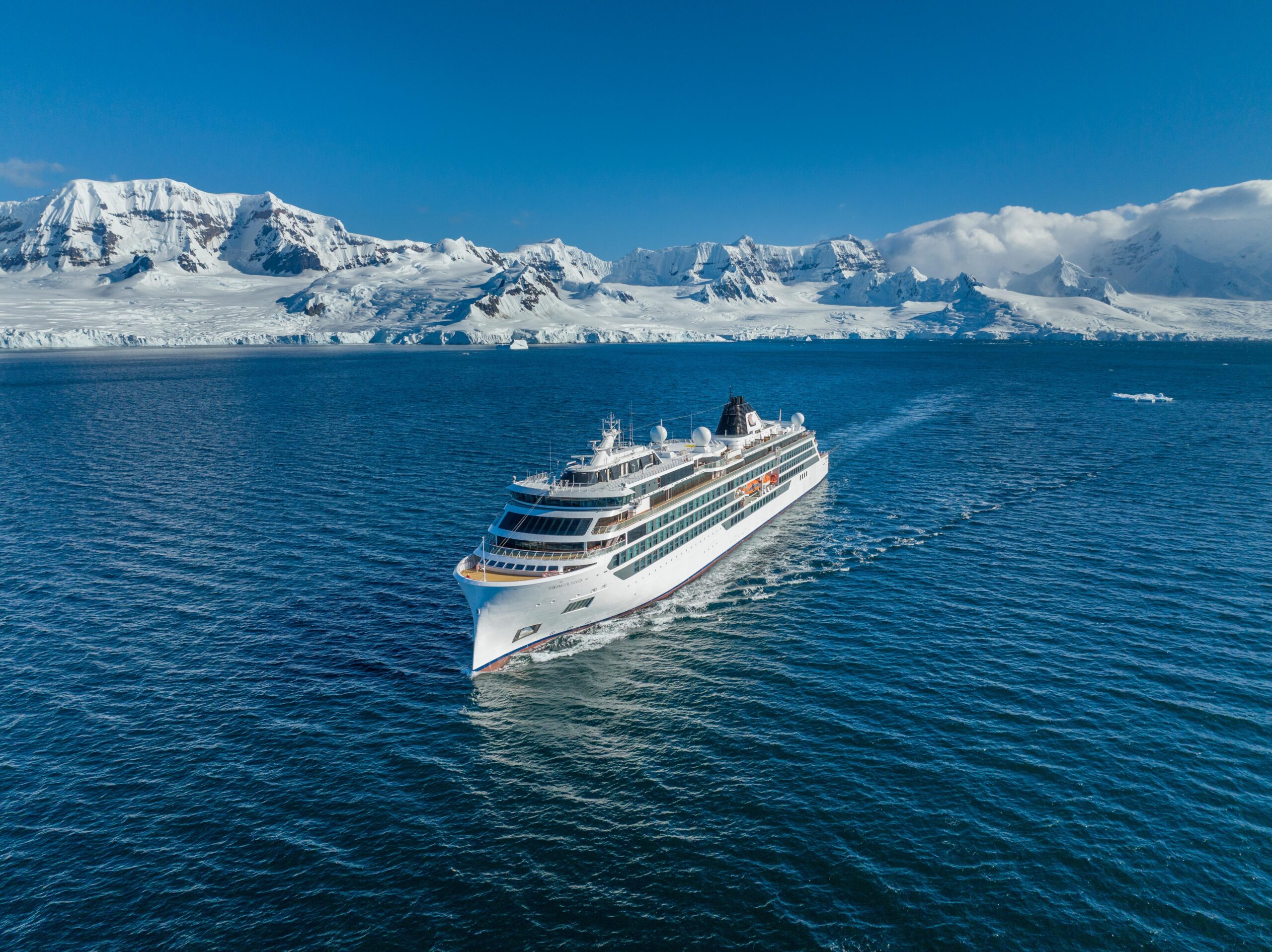 The luxury expedition cruise ship Viking Octantis navigates through pristine Antarctic waters