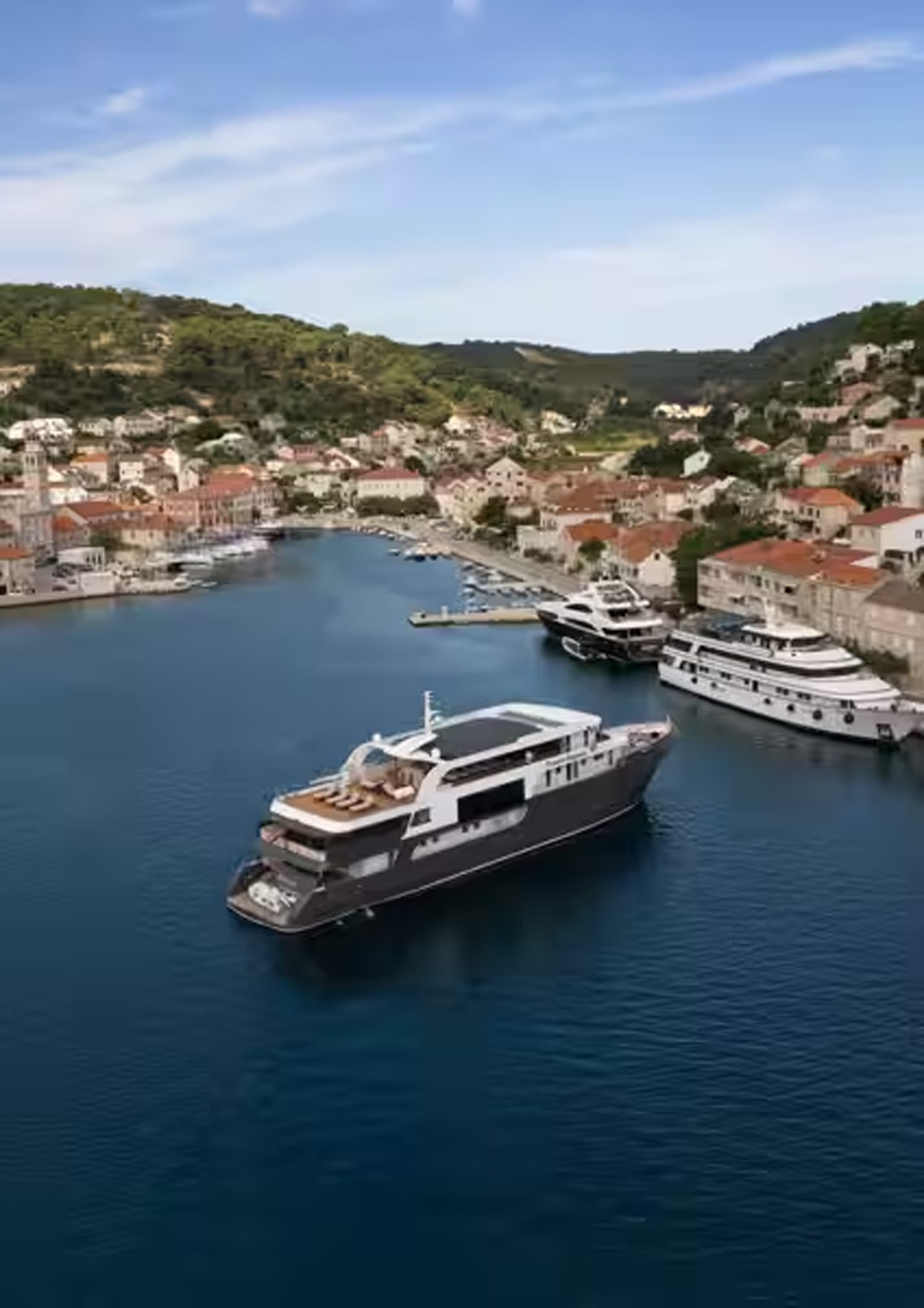 An aerial drone view of the Princess Eleganza luxury cruise ship anchored in the pristine blue