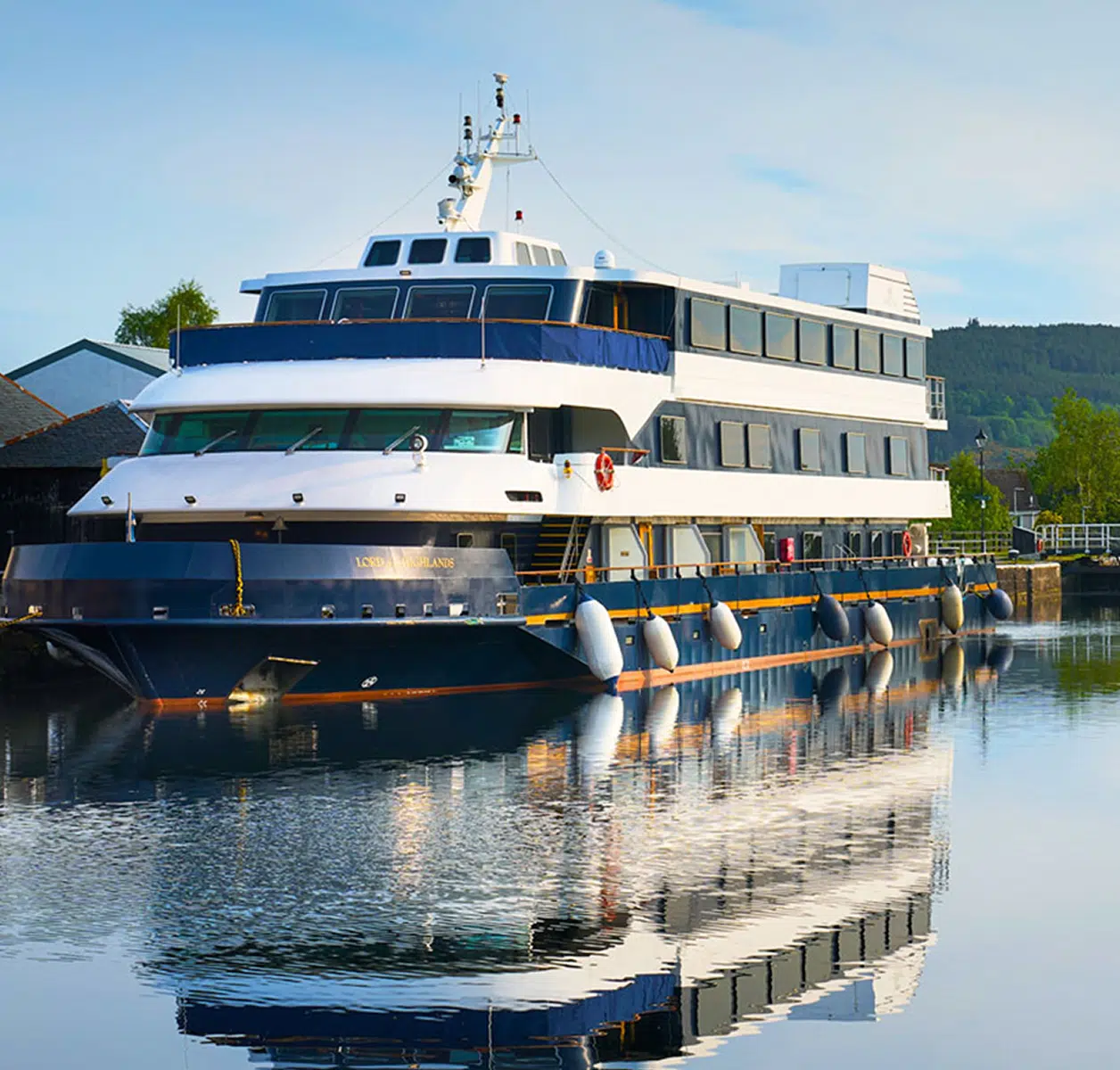 Lord of the Highlands Expedition Vessel Docked A luxury expedition cruise ship, the Lord of the Highlands, moored at a Scottish waterside dock