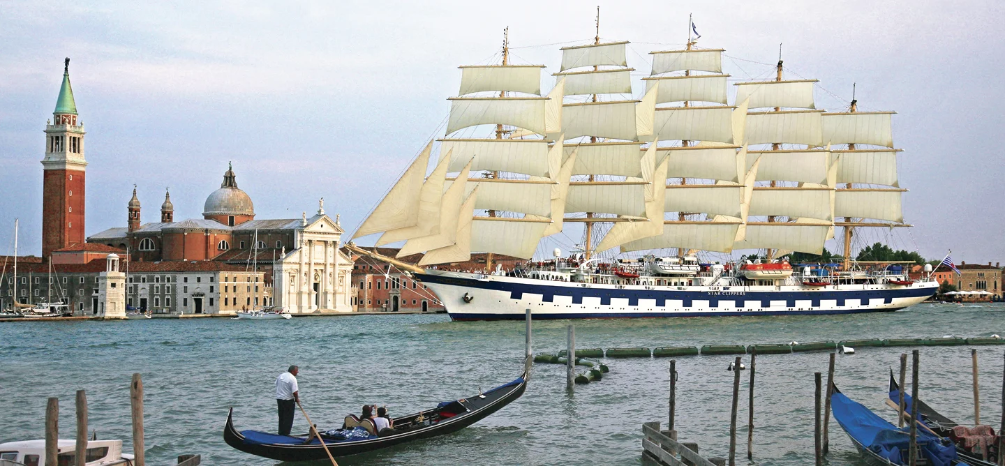 Royal Clipper Tall Ship in Venice The Royal Clipper, a stunning five-masted barque-rigged tall ship, sails majestically through