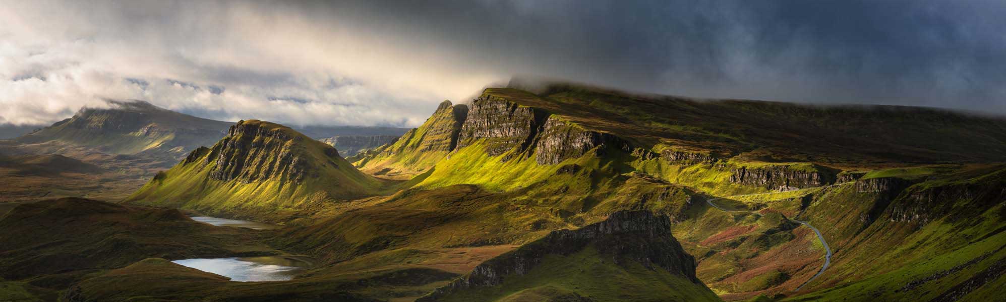 Dramatic Icelandic Mountain Landscape A breathtaking panoramic view of Iceland's rugged interior highlands, featuring distinctive layered