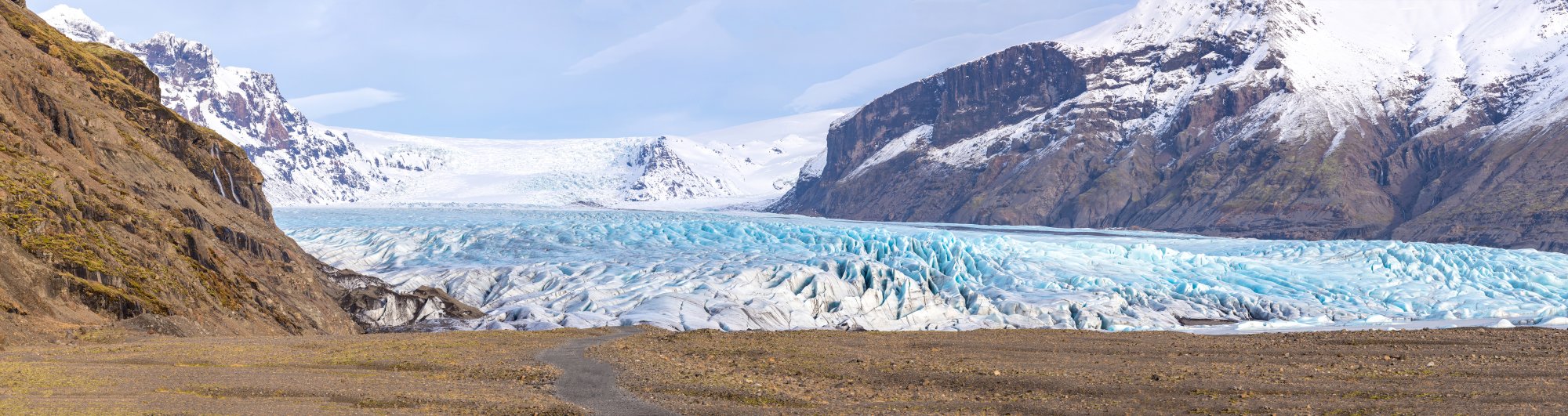Vatnajökull Glacier and Turquoise Ice Field A stunning panoramic view of Vatnajökull glacier in Iceland, showcasing brilliant turquoise