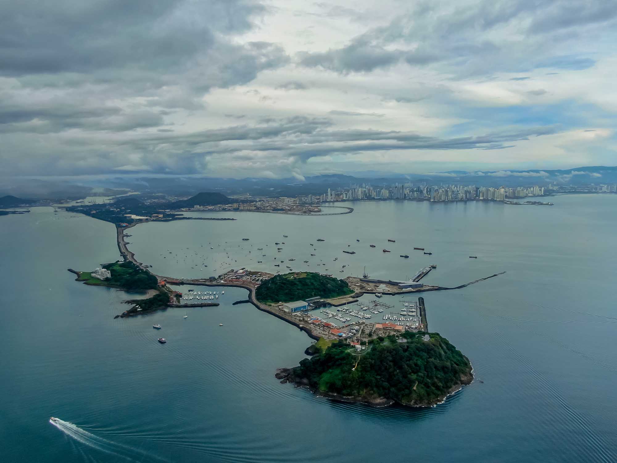 Aerial View of Panama City and Amador Causeway A stunning aerial photograph of Panama City's skyline across the bay, with the Amador Causeway