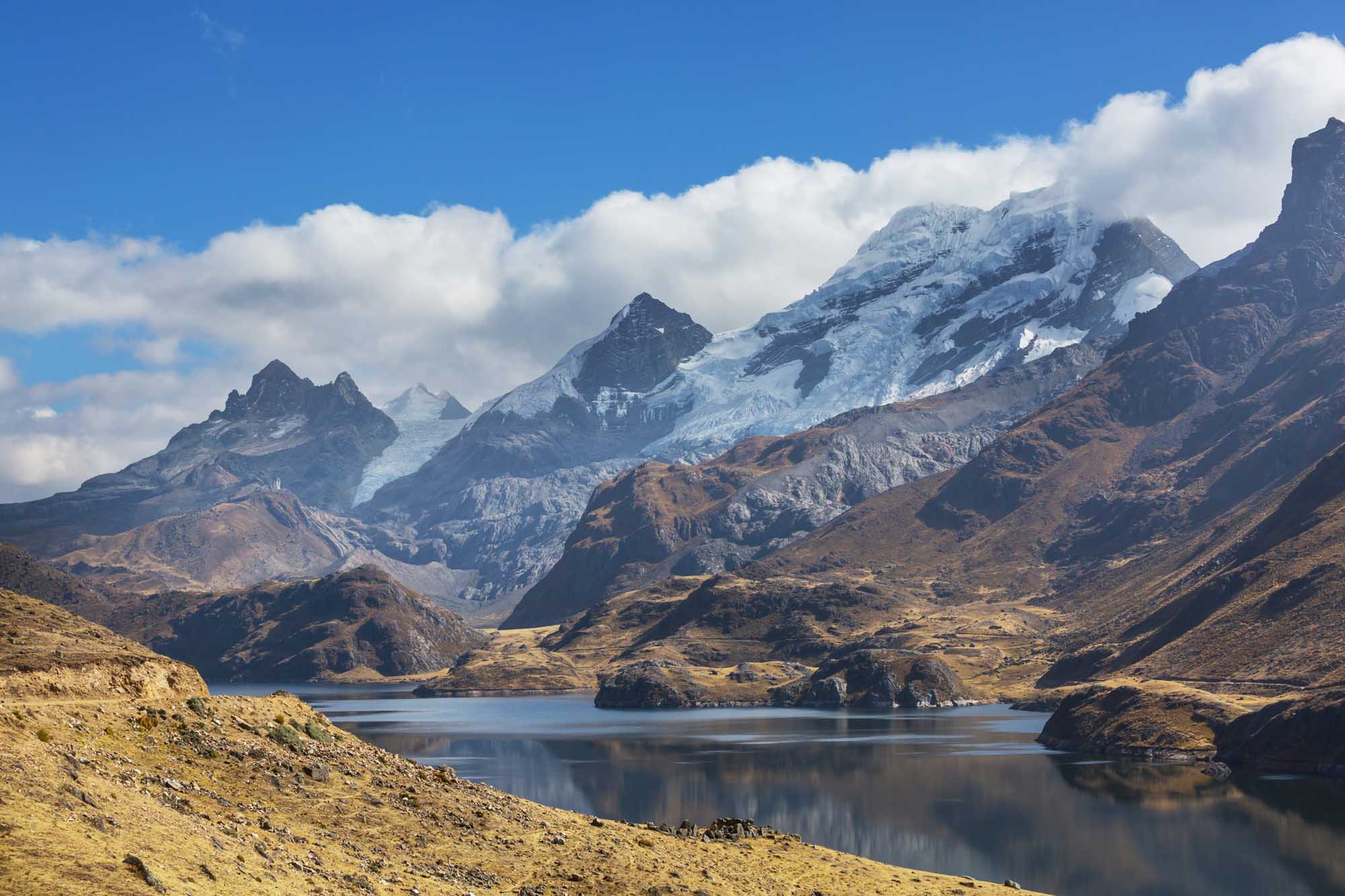 Alpine Lake in Cordillera Blanca, Peru A stunning high-altitude alpine lake nestled in the Cordillera Blanca mountain range