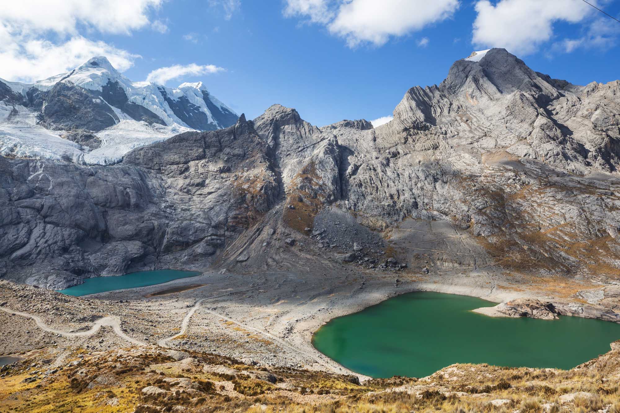 Alpine Lakes in Cordillera Blanca, Peru A stunning high-altitude landscape in Peru's Cordillera Blanca mountain range, featuring emerald
