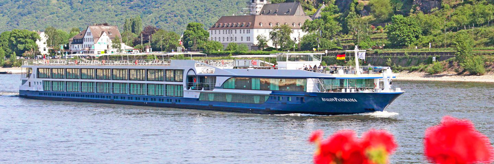 Avalon Panorama River Cruise Ship on Rhine The Avalon Panorama, a modern river cruise ship, navigates the Rhine River past picturesque German