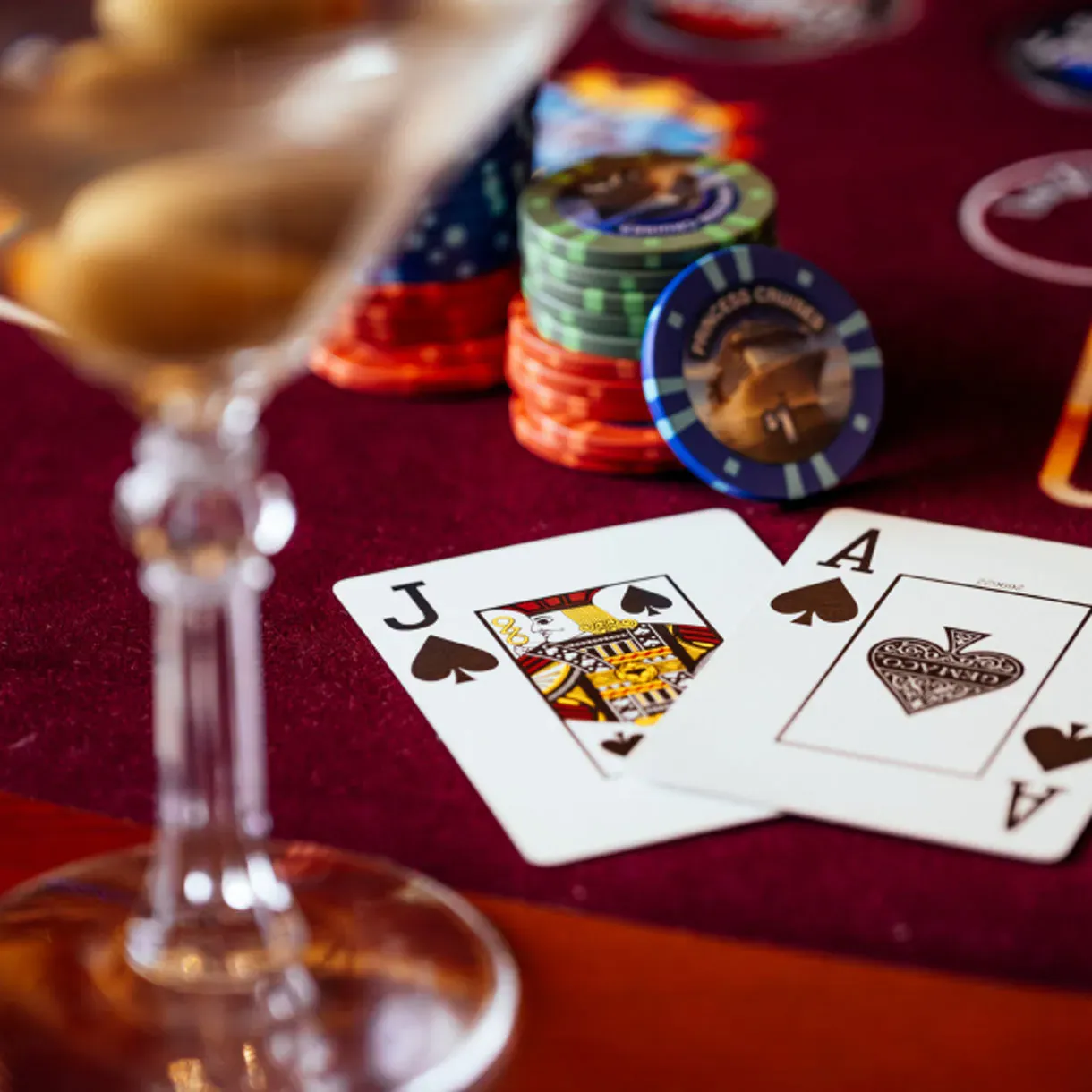 Casino Poker Game Aboard Princess Cruises A sophisticated casino scene aboard a Princess Cruises ship featuring two players engaged in
