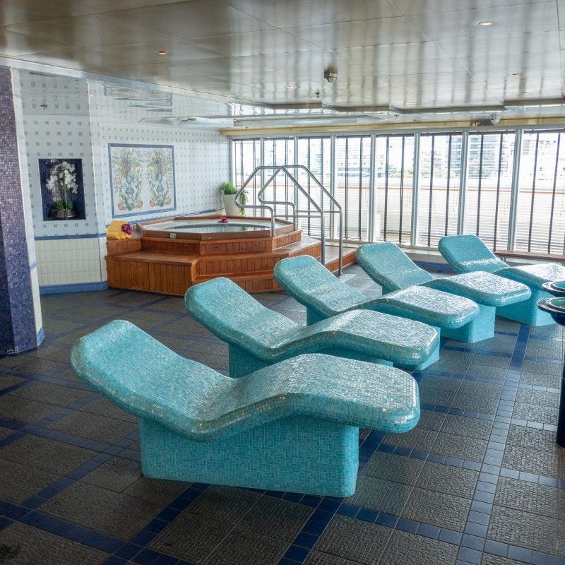Celestyal Cruises Spa and Wellness Deck An indoor spa and wellness area aboard a Celestyal Cruises vessel, featuring turquoise mosaic-tiled
