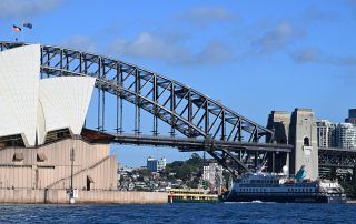 Douglas Mawson Cruise Ship Arriving in Sydney Harbour The expedition cruise ship Douglas Mawson passes beneath the iconic Sydney Harbour Bridge, with