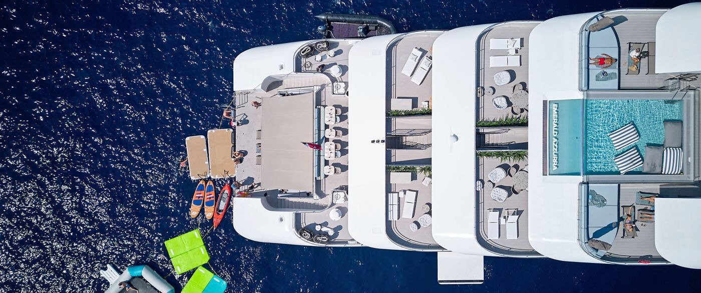 Emerald Azzurra Marina Platform Aerial View An aerial overhead view of the Emerald Azzurra expedition yacht moored in deep blue Mediterranean