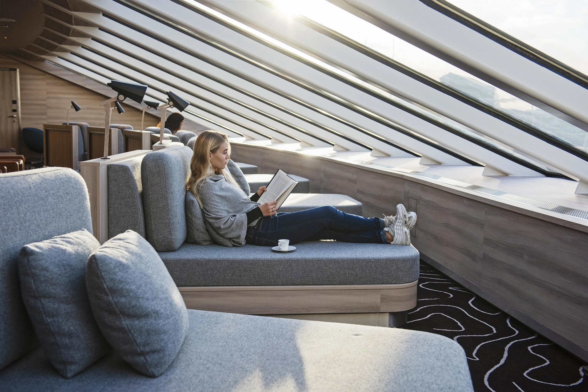 Explorer Lounge with Skylight Aboard MS Fridtjof Nansen A modern, light-filled lounge aboard the MS Fridtjof Nansen expedition cruise ship, featuring