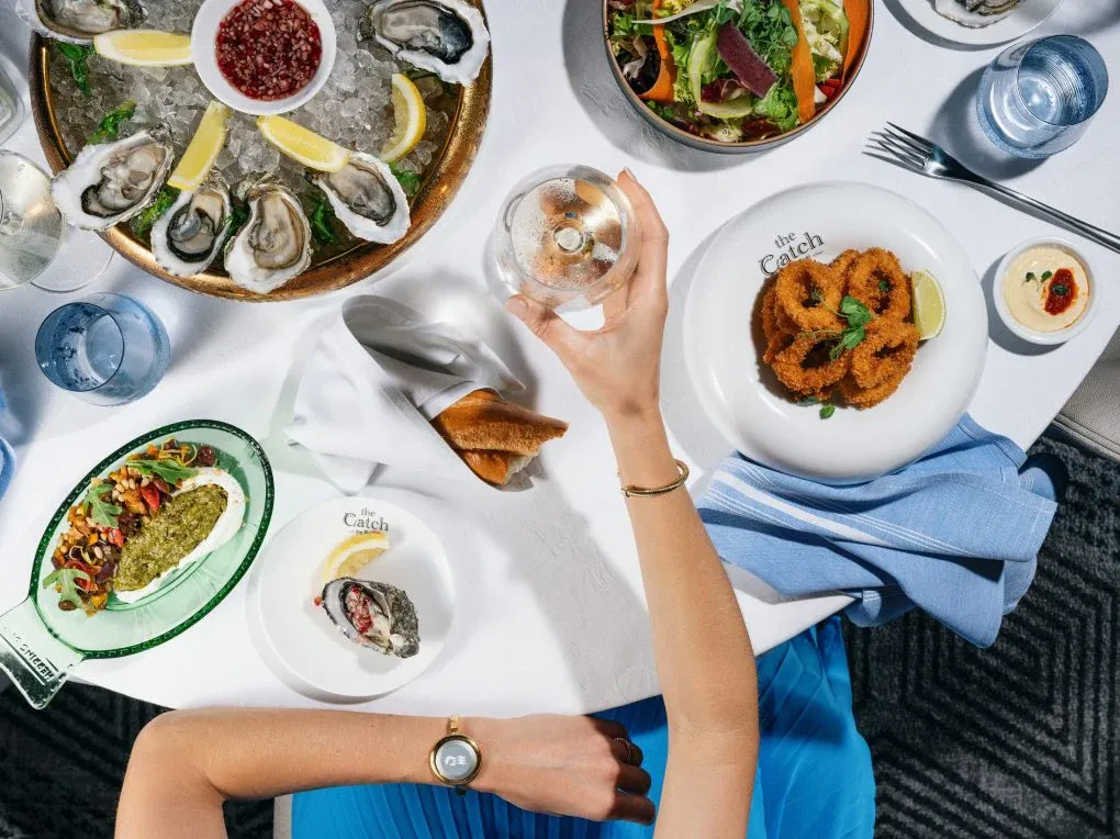 Fine Dining Experience at The Catch Restaurant An overhead view of an elegant seafood dining experience at The Catch restaurant aboard a Princess