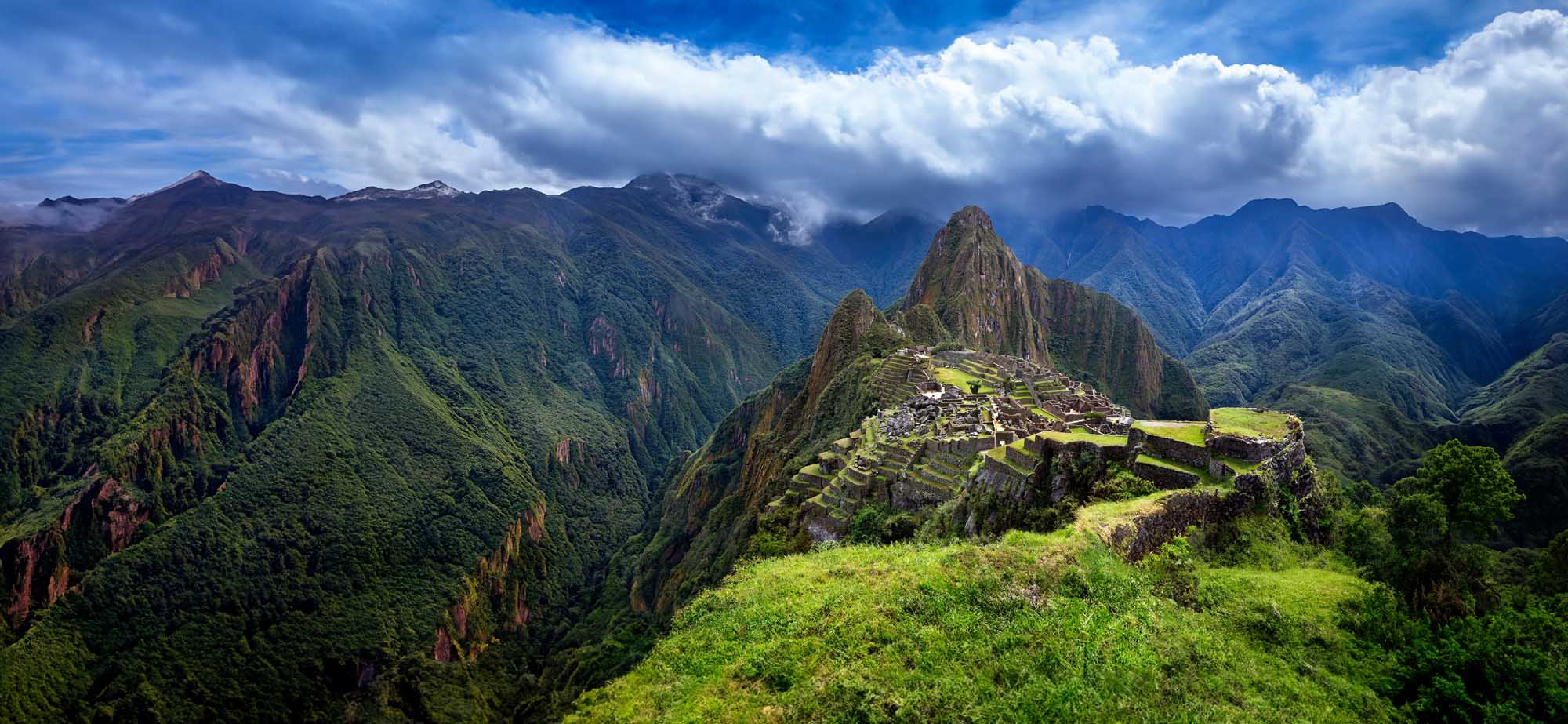 Machu Picchu Inca Citadel in the Andes Mountains A stunning aerial view of Machu Picchu, the iconic 15th-century Inca citadel perched on a mountain