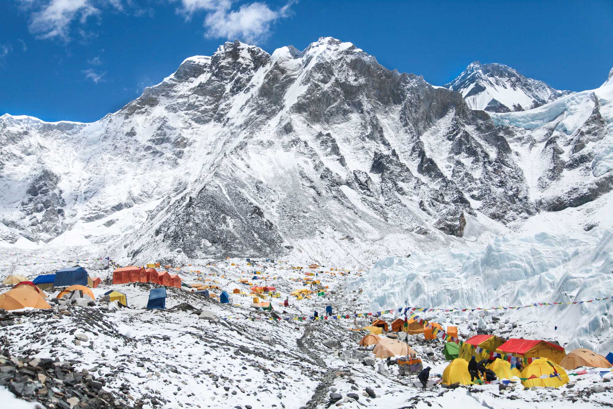 Mount Everest Base Camp with Colorful Tents A vibrant base camp at the foot of Mount Everest featuring numerous colorful expedition tents