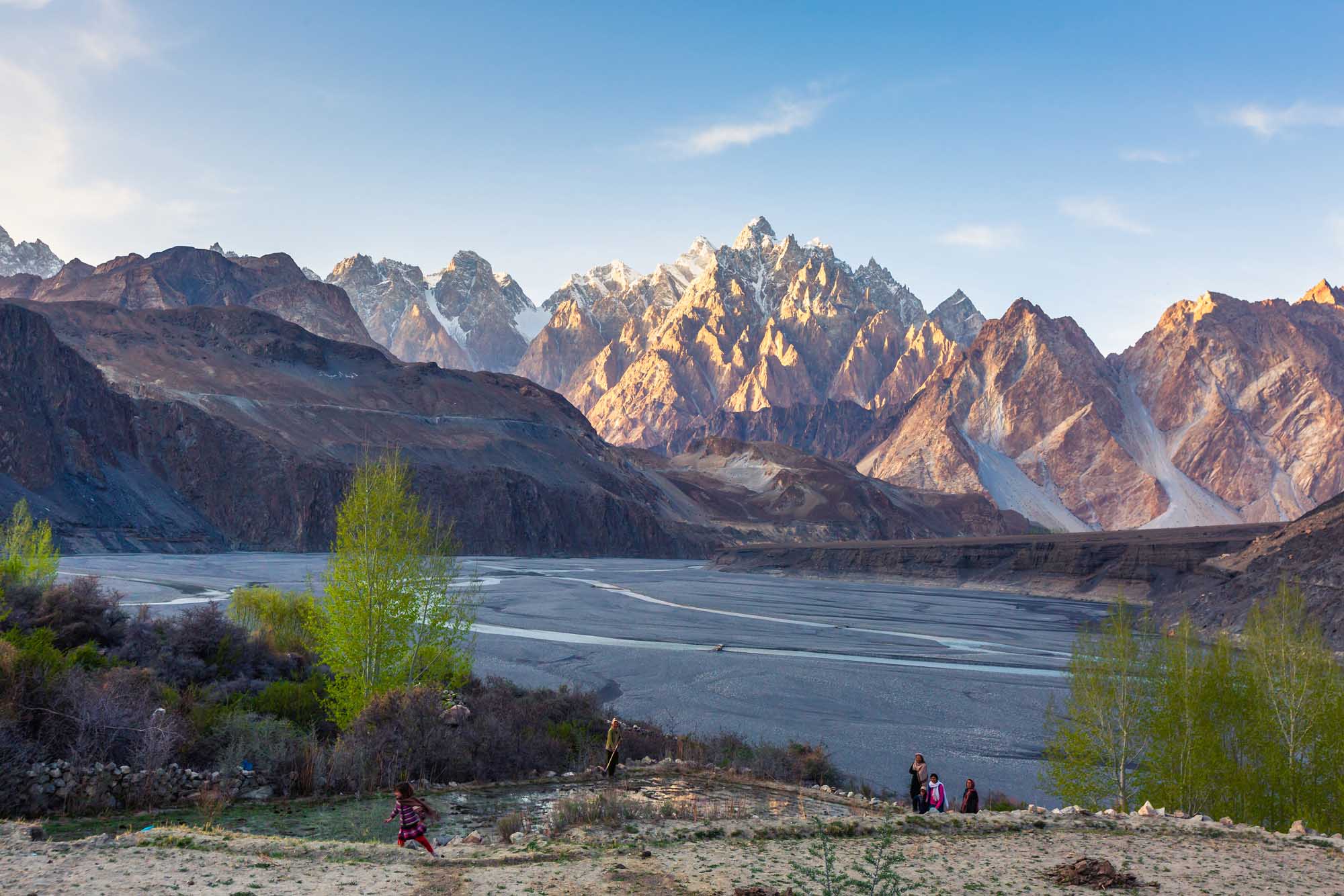 Passu Cathedral Mountain and Hunza River at Sunset A dramatic panoramic view of Tupopdan mountain, also known as Passu Cones or Passu Cathedral