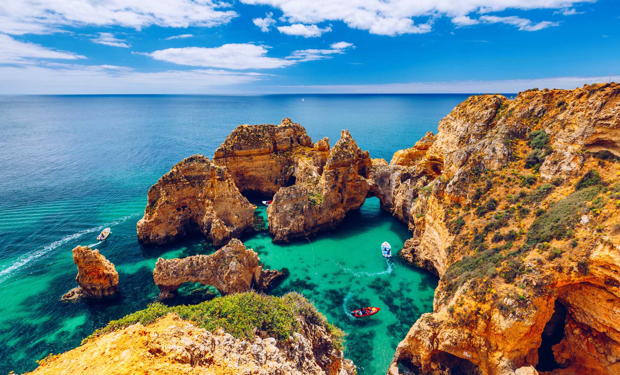 Ponta da Piedade Cliffs and Golden Rock Formations A stunning panoramic view of Ponta da Piedade near Lagos in Portugal's Algarve region, featuring