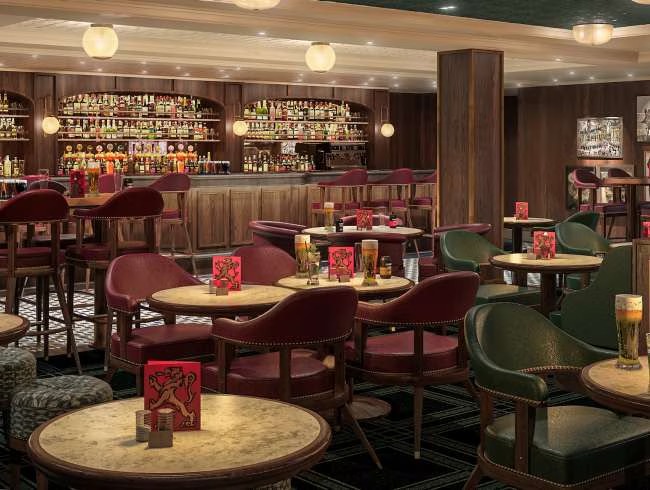Queen Anne Golden Lion Lounge Bar An elegant and luxurious bar lounge aboard Cunard's Queen Anne, featuring rich burgundy velvet