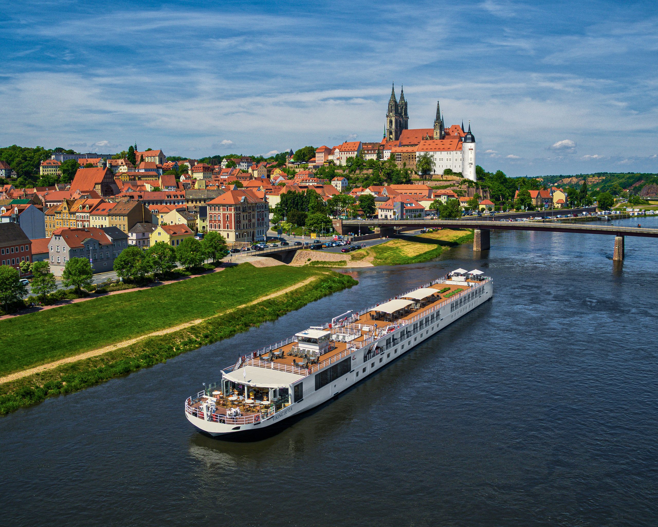 An aerial view of the CroisiEurope river cruise ship Astrild navigating the Elbe River through