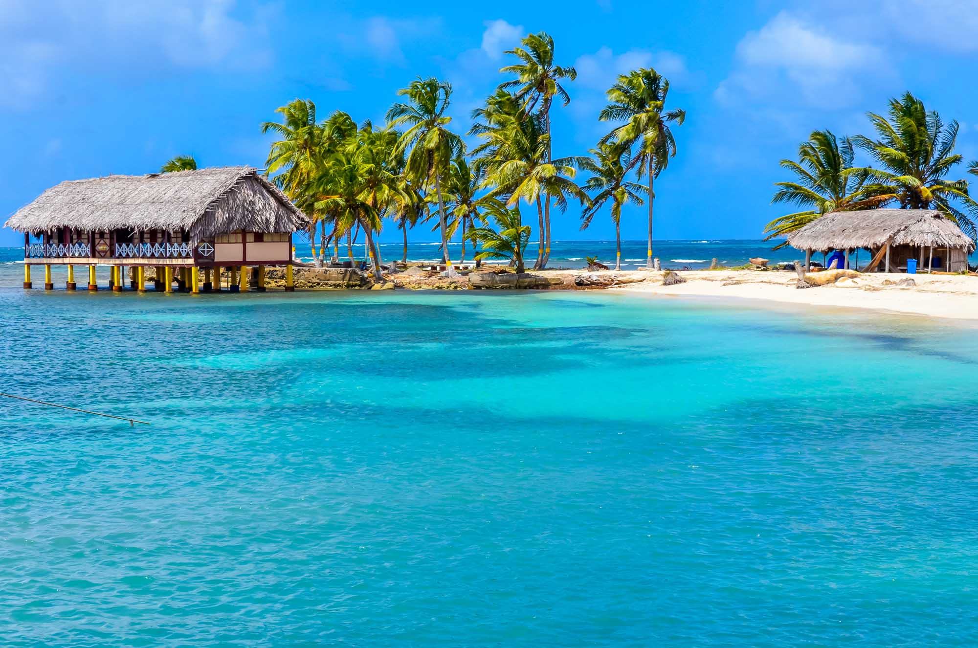 Tropical Beach Paradise in San Blas Islands A pristine tropical beach in Panama's San Blas Islands features crystal-clear turquoise waters