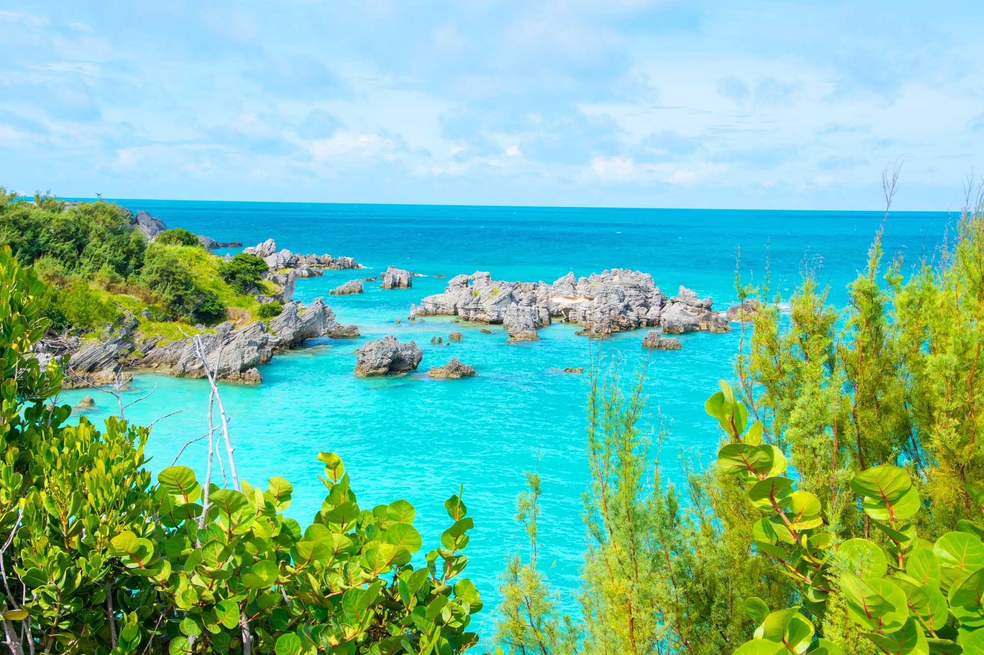 Turquoise Waters at Tobacco Bay, Bermuda A stunning coastal view of Tobacco Bay in St. George's, Bermuda, featuring crystal-clear turquoise