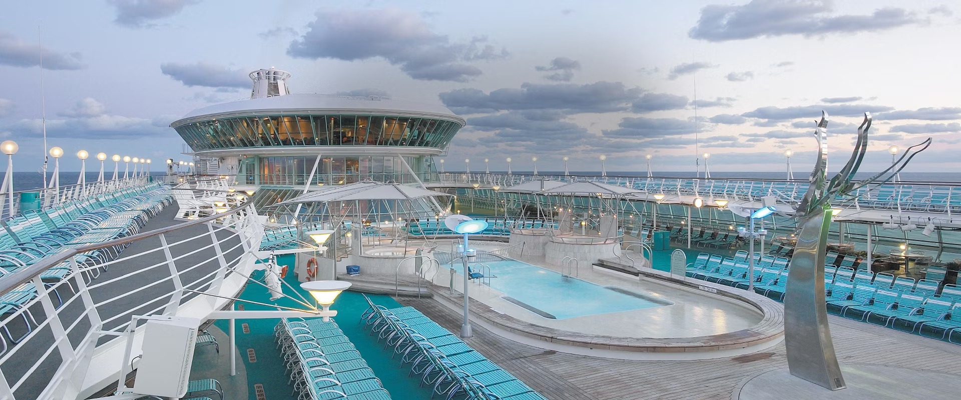Vision of the Seas Solarium Pool Deck A comprehensive view of the expansive pool deck aboard Royal Caribbean's Vision of the Seas
