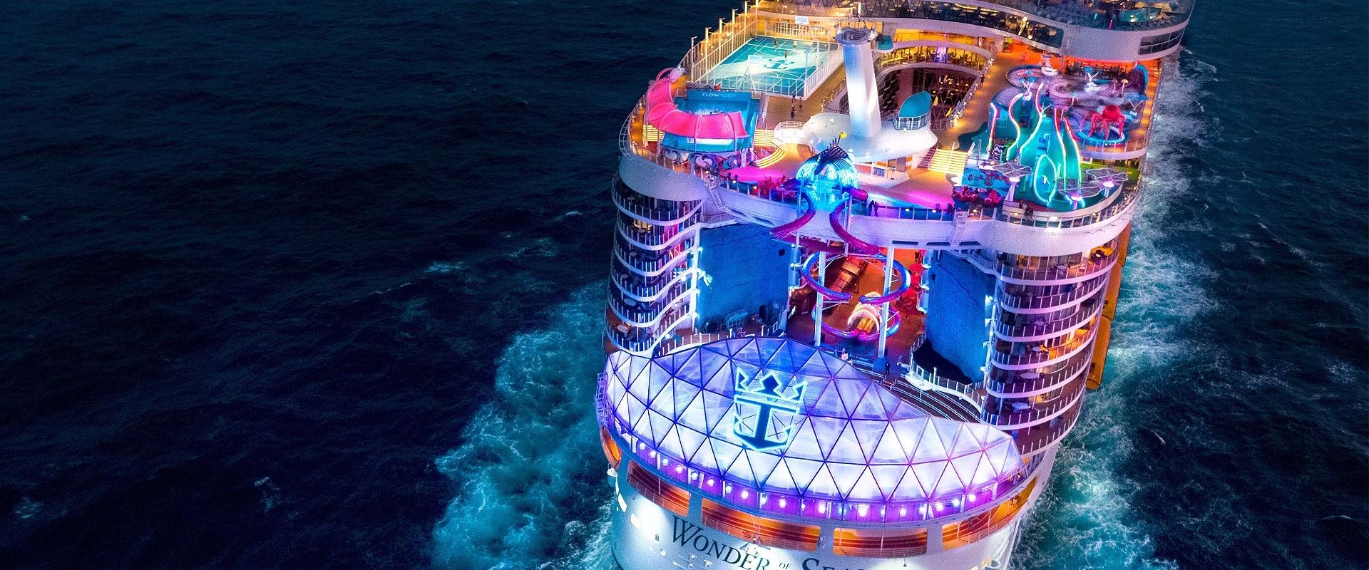 Wonder of the Seas Aft Dome at Night An aerial view of Royal Caribbean's Wonder of the Seas cruise ship at night, showcasing